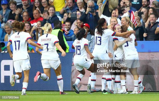 Lindsey Horan of the USA celebrates with teammates after scoring her team's first goal during the 2019 FIFA Women's World Cup France group F match...