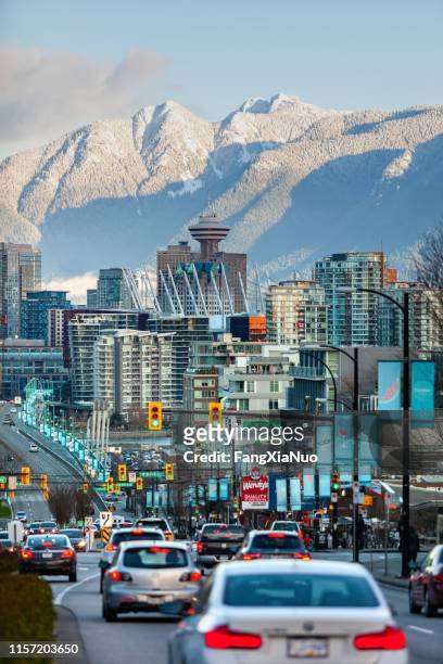traffic at cambie street bridge to downtown vancouver - vancouver stock pictures, royalty-free photos & images