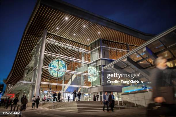 vancouver trade and convention center outdoor view at night, coal harbor financial district - vancouver canada 2019 stock pictures, royalty-free photos & images