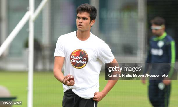 Arjun Tendulkar, son of Sachin in the nets bowling to Ireland players before the one off test match against Ireland at Lord's on July 22, 2019 in...