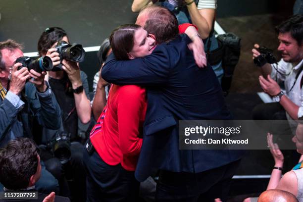 Liberal Democrat leadership contender Jo Swinson is congratulated by Ed Davey after being announced as the new Liberal Democrat party leader on July...