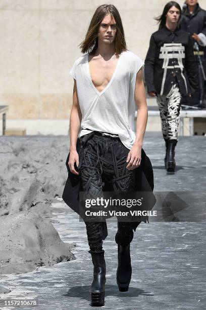 Model walks the runway at the Rick Owens fashion show during Paris Men's Fashion Week Spring/Summer 2020 on June 20, 2019 in Paris, France.