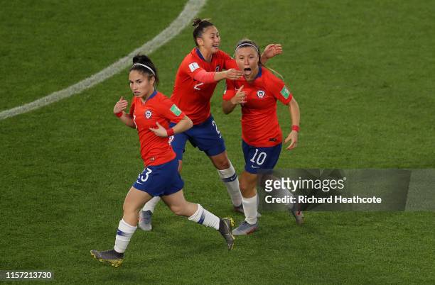 Javiera Grez, Rocio Soto, and Yanara Aedo of Chile celebrate after their team's first goal during the 2019 FIFA Women's World Cup France group F...