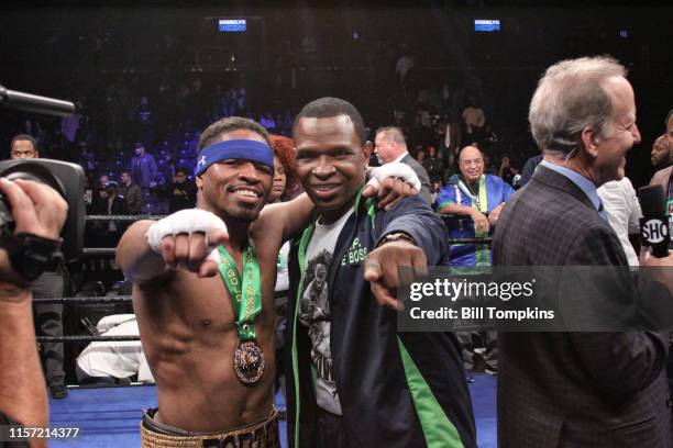 April 22: Shawn Porter and Kenny Porter posing after Porter defeats Andre Berto by TKO in the 9th round of their WBC welterweight title eliminator at...