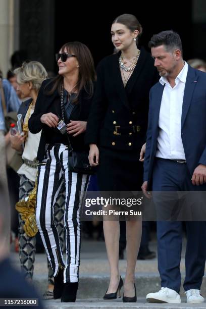 Babeth Djian and Gigi Hadid attend the Karl Lagerfeld Homage at Grand Palais on June 20, 2019 in Paris, France.