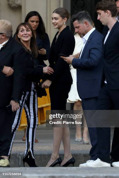 Babeth Djian and Gigi Hadid attend the Karl Lagerfeld Homage at Grand Palais on June 20, 2019 in Paris, France.