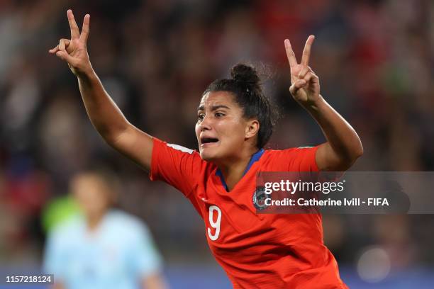 Maria Urrutia of Chile celebrates after scoring her team's second goal during the 2019 FIFA Women's World Cup France group F match between Thailand...
