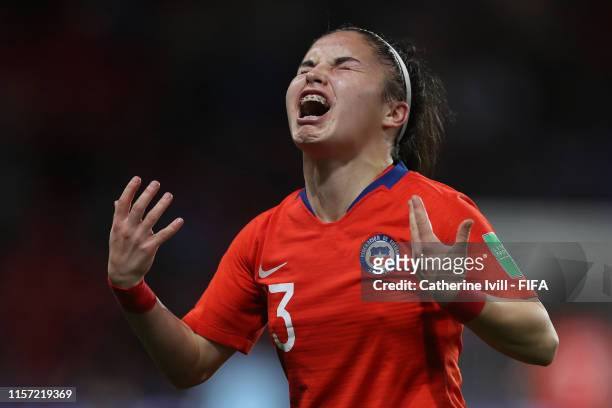 Javiera Grez of Chile reacts after getting injured during the 2019 FIFA Women's World Cup France group F match between Thailand and Chile at Roazhon...