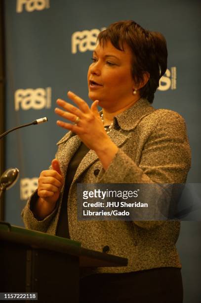Close-up of Lisa Jackson, chemical engineer and administrator, speaking from a podium during a Foreign Affairs Symposium at the Johns Hopkins...