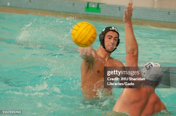 Johns Hopkins Blue Jays Men's Water Polo player throws the ball while participating in a game against George Washington University, October 9, 2009....