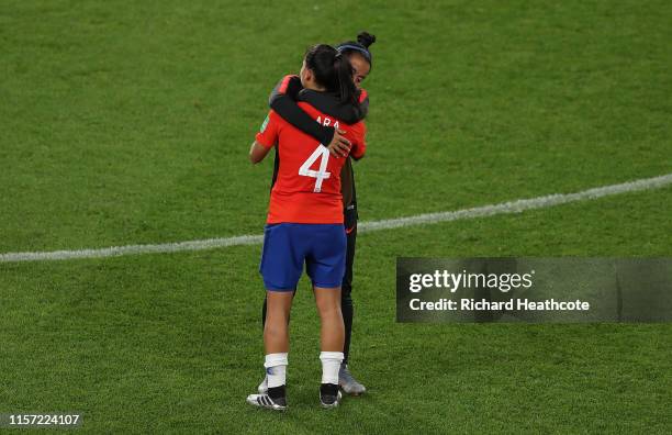 Francisca Lara of Chile is consoled after the 2019 FIFA Women's World Cup France group F match between Thailand and Chile at Roazhon Park on June 20,...