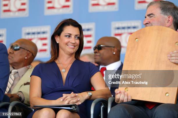 Brandy Halladay, wife of inductee Roy Halladay, speaks with Tim Mead, President of the National Baseball Hall of Fame and Museum, during the 2019...