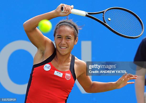 Britain's Heather Watson returns to China's Shuai Peng during the fourth day of the WTA AEGON Classic tennis tournament at Edgbaston Priory Club,...