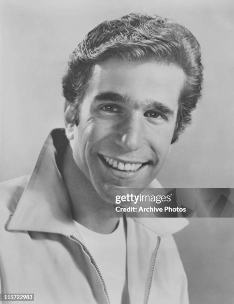 Henry Winkler, US actor, smiling and wearing a zip-up jacket with the collar up, USA, circa 1975.