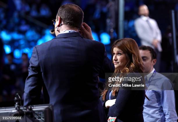 Reporters Rachel Nichols and Adrian Wojnarowski speak before the start of the 2019 NBA Draft at the Barclays Center on June 20, 2019 in the Brooklyn...