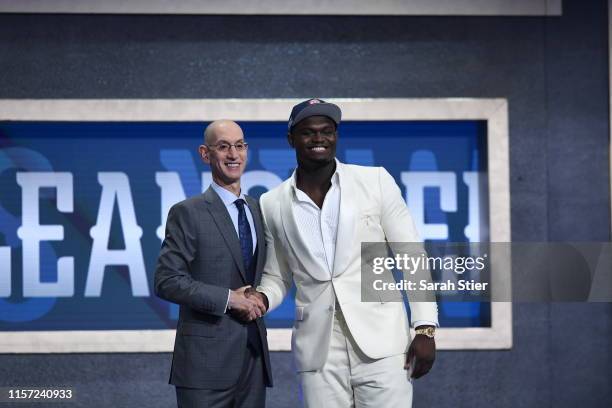 Zion Williamson poses with NBA Commissioner Adam Silver after being drafted with the first overall pick by the New Orleans Pelicans during the 2019...