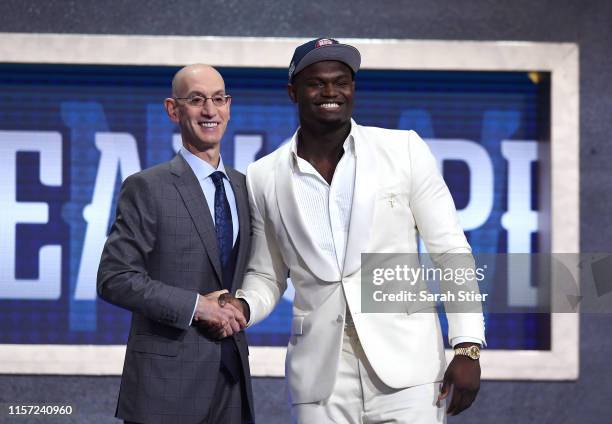 Zion Williamson poses with NBA Commissioner Adam Silver after being drafted with the first overall pick by the New Orleans Pelicans during the 2019...