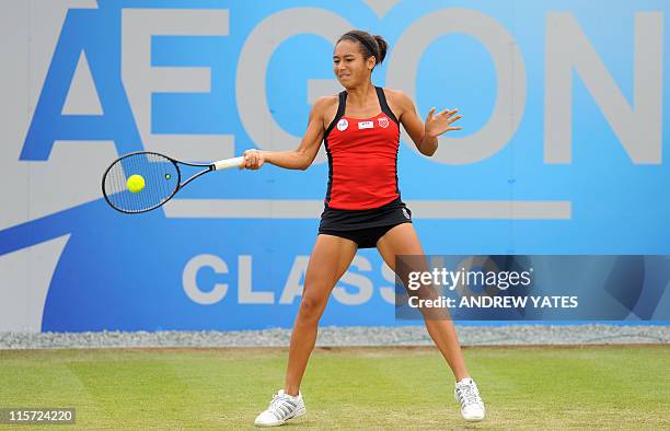 Britain's Heather Watson returns to China's Shuai Peng during the fourth day of the WTA AEGON Classic tennis tournament at Edgbaston Priory Club,...