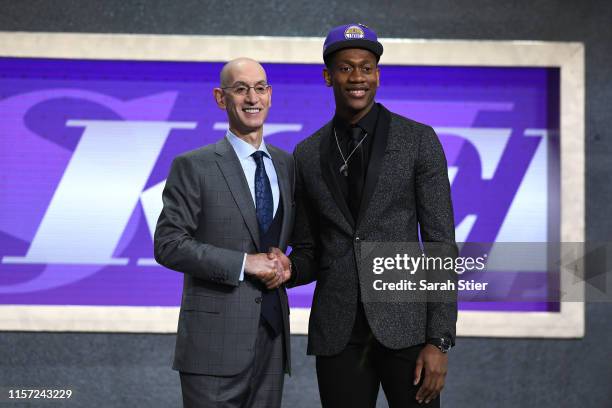 De'Andre Hunter poses with NBA Commissioner Adam Silver after being drafted with the fourth overall pick by the Los Angeles Lakers during the 2019...