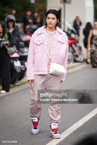 Kris Wu is seen, outside Vuitton, during Paris Fashion Week - Menswear Spring/Summer 2020, on June 20, 2019 in Paris, France.