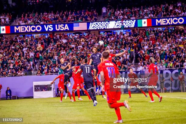 Mexico defender Diego Reyes heads the ball during the CONCACAF Gold Cup final match between the United States and Mexico on July 07 at Soldier Field...