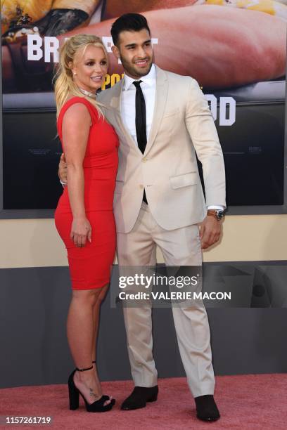 Singer Britney Spears and boyfriend Sam Asghari arrive for the premiere of Sony Pictures' "Once Upon a Time... In Hollywood" at the TCL Chinese...