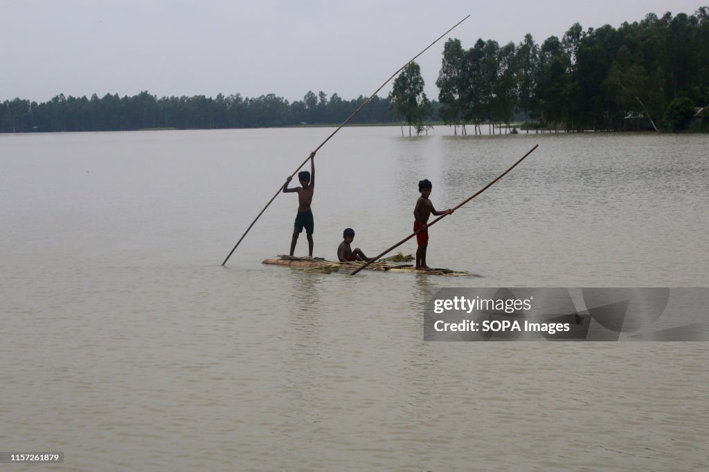 Villagers resorted to travelling on makeshift rafts...