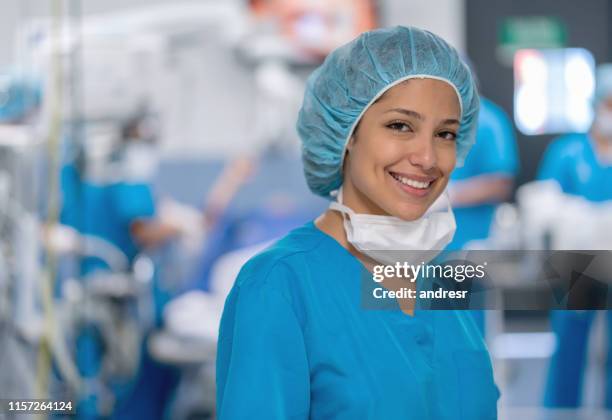 portrait of a surgeon in the operating room - nurse hat stock pictures, royalty-free photos & images