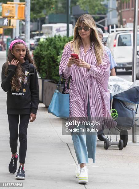 Heidi Klum and Lou Samuel are seen on June 20, 2019 in New York City.