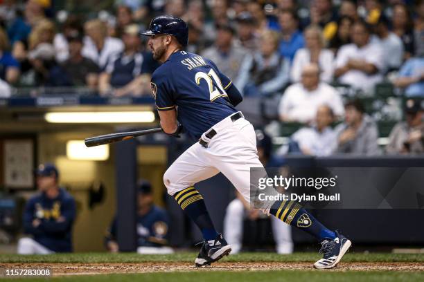 Travis Shaw of the Milwaukee Brewers grounds out in the seventh inning against the Cincinnati Reds at Miller Park on June 20, 2019 in Milwaukee,...