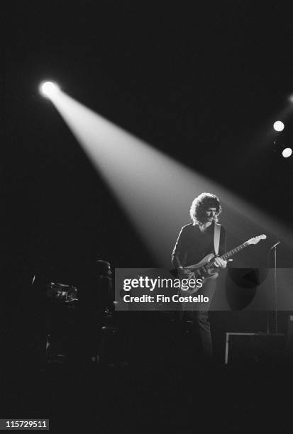 Bruce Kulick, US guitarist, under the spotlight during a live concert performance, with Kulick playing the guitar as a member of Meat Loaf's touring...