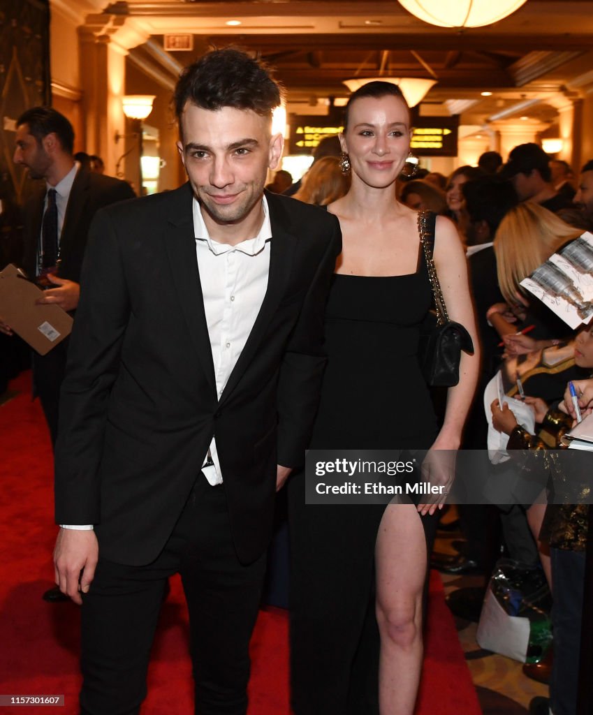 Actor Jay Baruchel and Rebecca jo Dunham arrive at the 2019 NHL... News