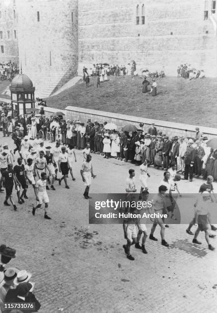 Competitors in the marathon pass through Windsor during the 1908 Summer Olympics in London, 24th July 1908.