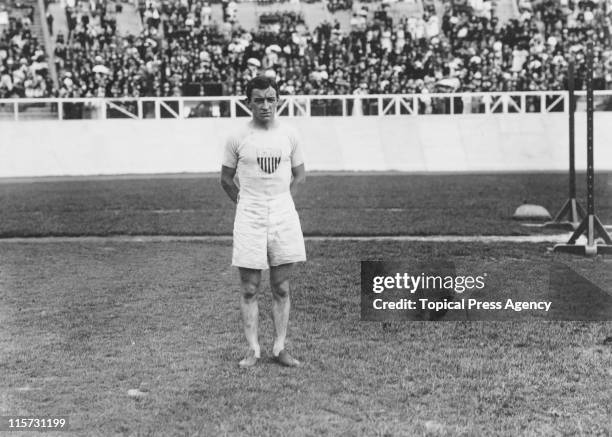 Athlete Johnny Hayes wins the marathon at the 1908 Summer Olympics in London, 24th July 1908. Italy's Dorando Pietri was in fact the first to reach...