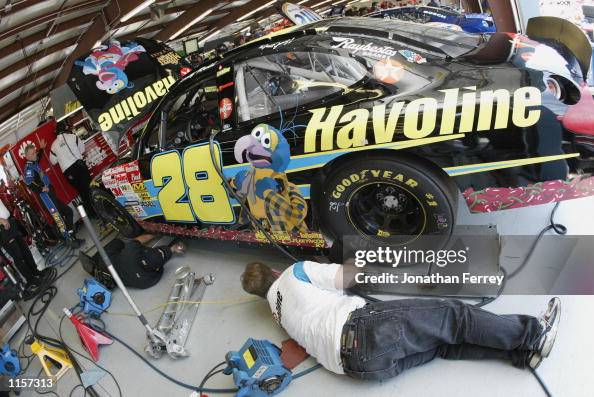 Ricky Rudd 2002 Ricky Rudd Crew members work on Ricky Rudd Havoline Racing Ford on July 12, 2002 ...