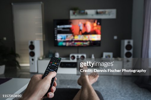 Remote Control with Television in living room Remote Control with Television in living room