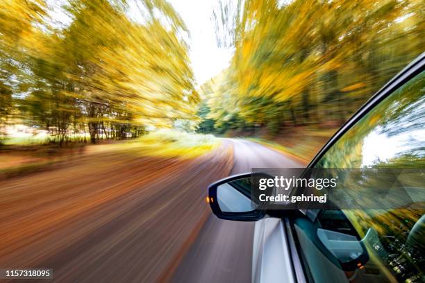 driving on the road - hungary countryside stock pictures, royalty-free photos & images