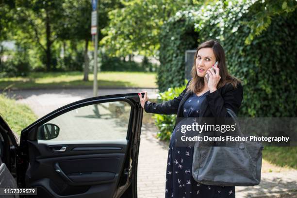 pregnant woman at work - pregnant woman car stock pictures, royalty-free photos & images