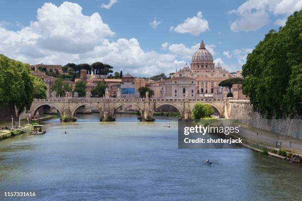 st peter's basilica and city skyline, rome, lazio, italy - river tiber stock pictures, royalty-free photos & images