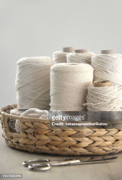 close-up of macrame yarn in a basket with scissors - macrame stock pictures, royalty-free photos & images