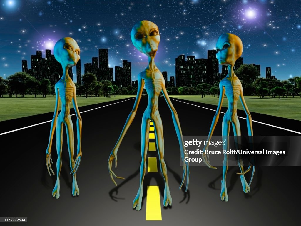 Aliens on road to city