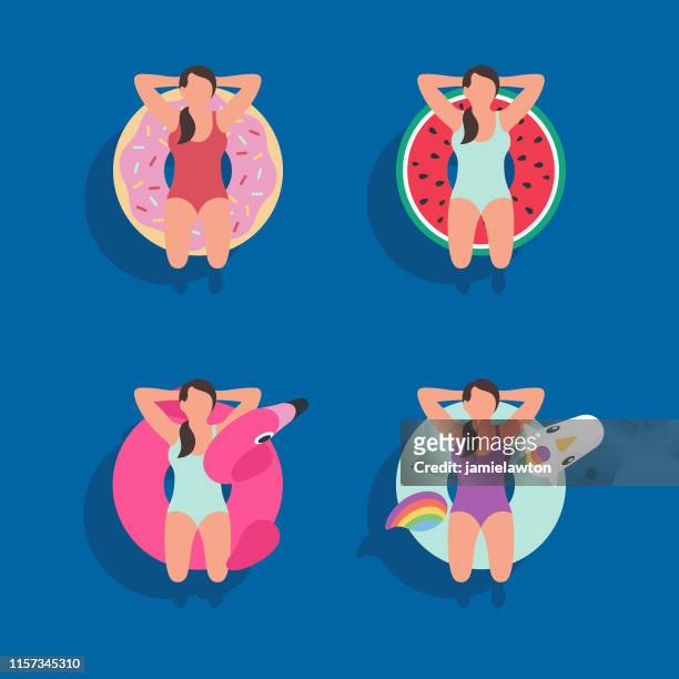 neuheit aufblasbare ringe und pool schwimmer - flamingos stock-grafiken, -clipart, -cartoons und -symbole