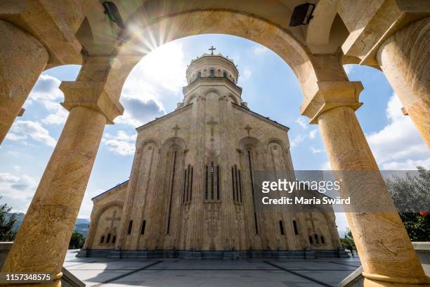 tbilisi - holy trinity cathedral with sunstar - tbilisi ストックフォトと画像