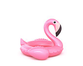 Inflatable pink flamingo isolated on white