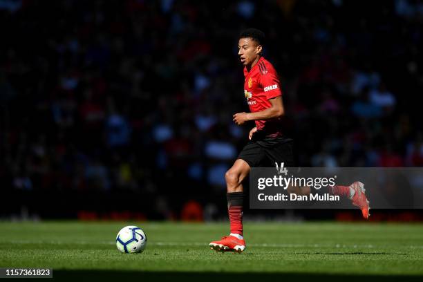 Jesse Lingard of Manchester United takes the ball forward during the Premier League match between Manchester United and Cardiff City at Old Trafford...