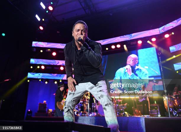 Singer Andy Vargas performs onstage with the Santana band during the opening night of the "Supernatural Now" tour at FivePoint Amphitheatre on June...