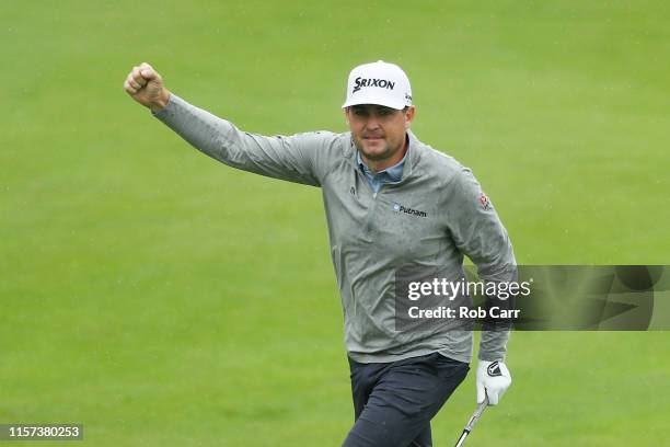 Keegan Bradley of the United States celebrates making an eagle on the 15th hole during the second round of the Travelers Championship at TPC River...