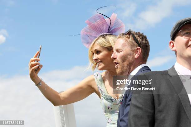 Jenni Falconer and James Midgley in the Village Enclosure on day 4 of Royal Ascot at Ascot Racecourse on June 21, 2019 in Ascot, England.