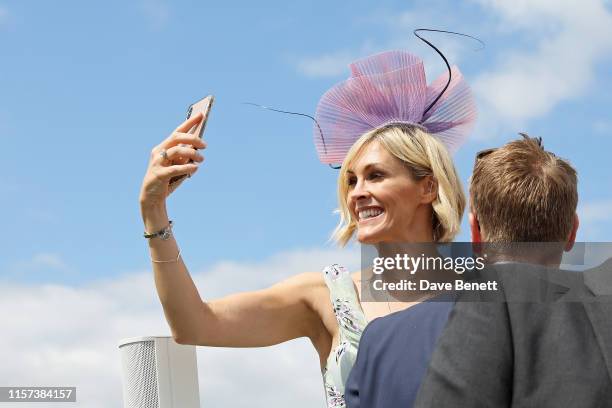 Jenni Falconer and James Midgley in the Village Enclosure on day 4 of Royal Ascot at Ascot Racecourse on June 21, 2019 in Ascot, England.