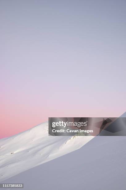 snowy mountain in the pyrenees. - moutain sunset snow stock-fotos und bilder